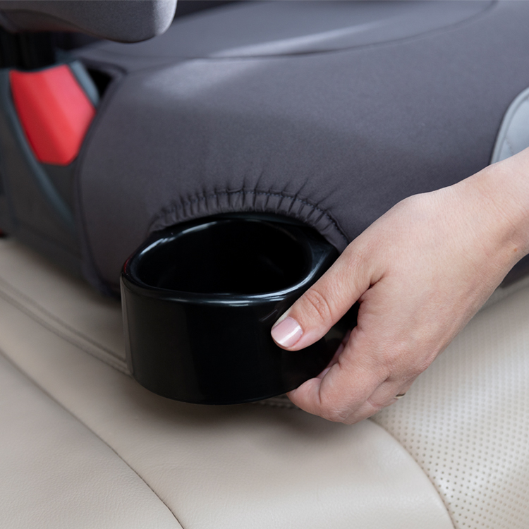 A hand pulling out the retractable cupholder of the Graco Logico L car seat
