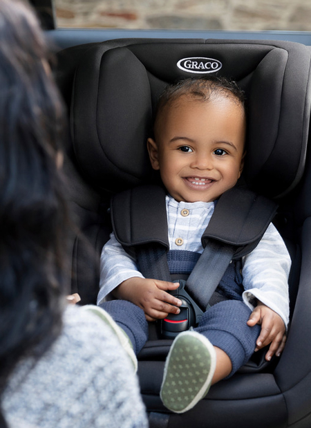 Turn2Me car seat with smiling baby boy